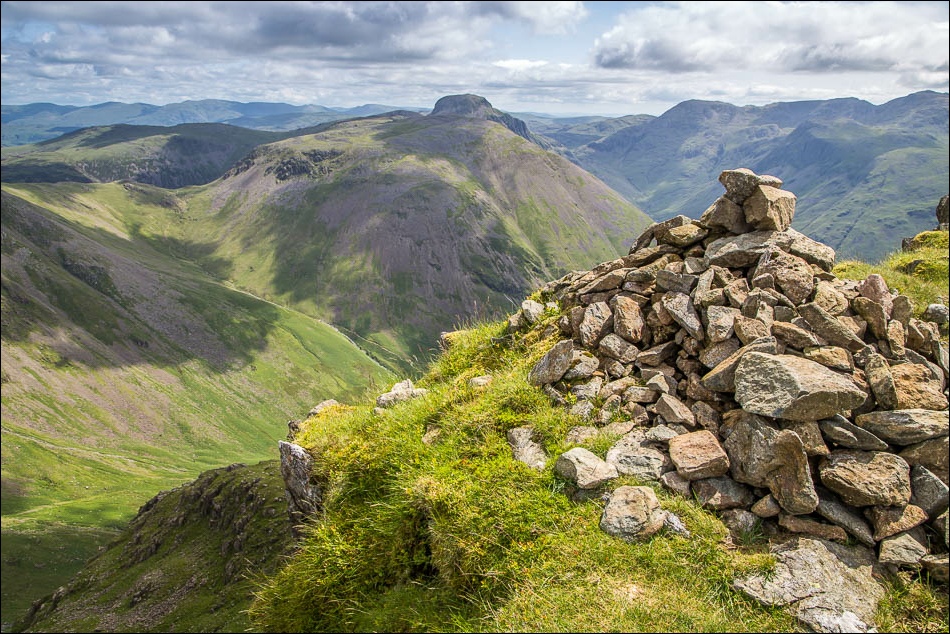 Summit cairn on Red Pike, looking towards Kirk Fell and Great Gable